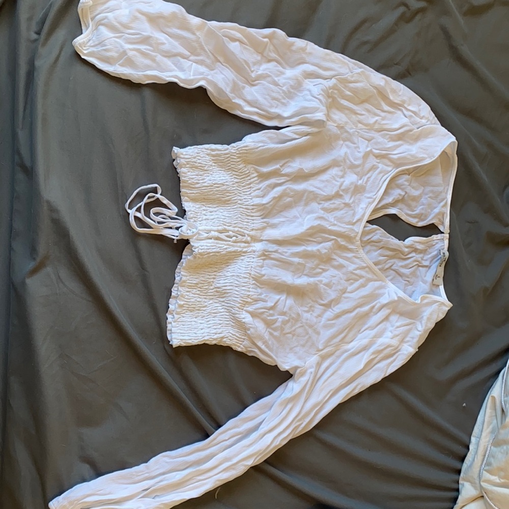 Cute rouched white shirt. Barely worn